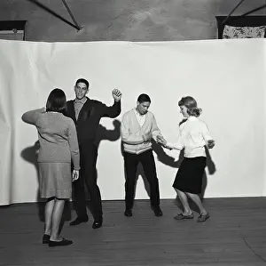 Medium Length Prints: Two teenage couples dancing