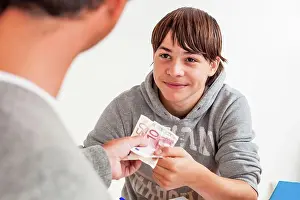 Money Prints: Teenager, Father giving pocket money to his son