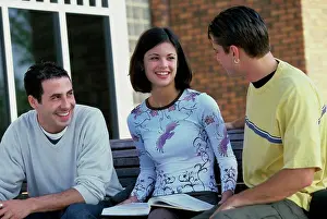 Pane Prints: Three teenagers talking to each other