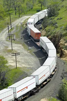 Vehicles Prints: The Tehachapi Train Loop near Tehachapi California is the historic location of the Southern Pacific Railroad where