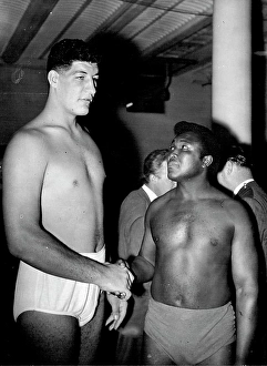 Compete Prints: Templar Measures Up Potty Jamaican boxer Simon Templar feels he's long way to go to reach the jaw of his giant