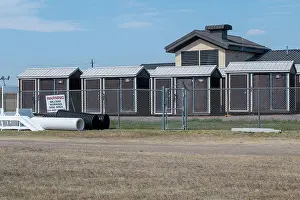 Montana Prints: Temporary dog kennels occupy the front of the 341st Security Forces Squadron military working dog compound during