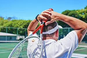 Strong Prints: Tennis court, competition and mature man with racket for fitness