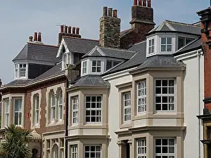 Residential Area Prints: Terraced houses with large windows and tiled roofs in an urban environment