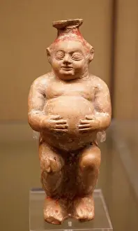 Perfume Prints: Terracotta perfume vessels in the shape of a fat dwarf