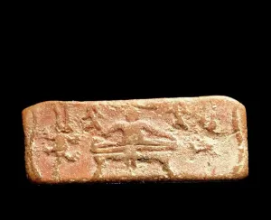 Pakistan Prints: Terracotta seal with a male cult figure; from the Indus Valley civilization at Mohenjo Daro; Indian Sub-continent;
