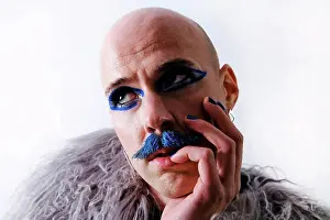 Bald Prints: Thoughtful man looking away against white background
