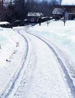 Tire tracks on a snow covered road, Chamonix, France
