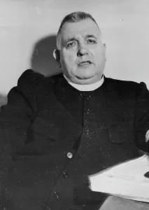 1946 Prints: Tiso, On 113 Charges, Fights For His Life -- Father Jozef Tiso in the prison of the National Court
