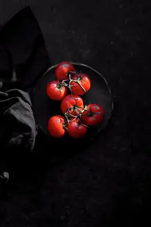 Ingredient Prints: Tomatoes on a black background