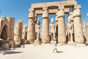 Explorations Prints: Tourist admiring the ancient temple in Luxor - Egypt