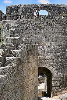 Castell Prints: Tourist walking on the Castle ramparts