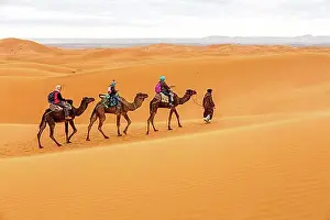Tourists in the Erg Chebbi Desert, Morocco, Africa