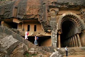 Buddhist Prints: Tourists at Indian heritage place called Bhaja caves with Chaitya hall built during reign of king Ashoka ; Lonavala ;