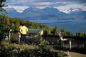 Visitor Prints: Tourists take pictures of the view of the Homer Spit