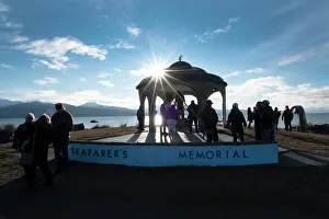 Sunburst Prints: Tourists at the Seafarer's Memorial on the coast of Alaska; Homer