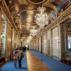 Small Group Prints: Tourists walking in a corridor of stockholm palace, stockholm sweden