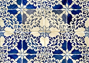 Ceramics Prints: Traditional blue colored tiles decorating old Lisbon buildings