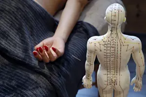 Interieur Prints: Traditional chinese medecine. A male model with marked acupuncture points