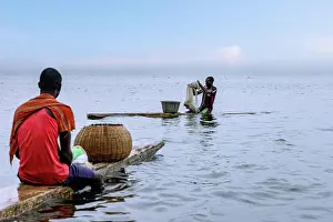 Somebody Prints: traditional fishermen at Lake Bosumtwi near Abono in the Ashanti Region of central Ghana in West Africa