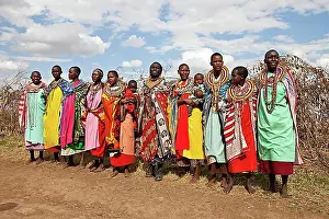 East Africa Prints: Traditionally decorated Maasai women wearing traditional dress during a vocal demonstration