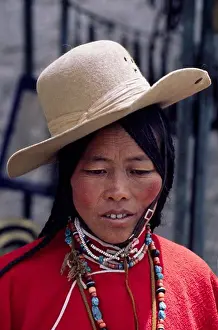 Verticals Prints: Traditionally dressed TIBETAN WOMAN on the BARKHOR or TIBETAN Bazaar - LHASA, TIBET