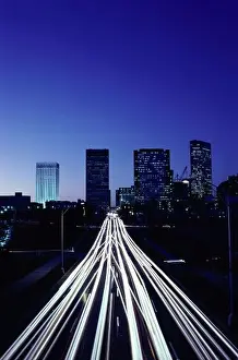 Urgency Prints: Traffic on a road at night
