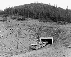 Colorado Prints: Train coming out from a tunnel of an iron mine, Colorado, USA