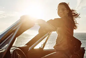 Drive Prints: Travel, car and portrait with woman by ocean for outdoor summer sunset