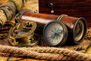 Instrument Prints: Travel geography navigation concept background - old vintage retro compass with sundial