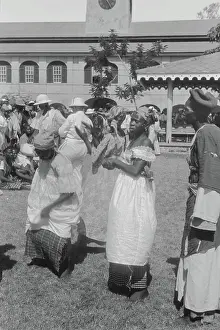 Travel photos Haiti. Event Square. View with dancing and singing women