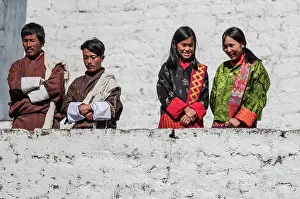Pilgrimage Prints: TRONGSA, BHUTAN - JANUARY 6, 2017: Bhutanese people in traditional clothes watching the annual Tsechu of Trongsa Dzong