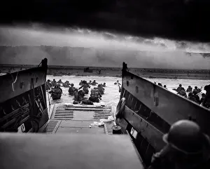 Normandy Prints: US Troops wading through water after reaching Normandy and landing Omaha beach on D Day 1944