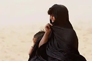 Arid Prints: Tuareg woman on a sand dune near Timbuktu, Mali