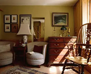 Livingrooms Prints: Tub armchairs and antique chest-of-drawers in traditional cottage living room