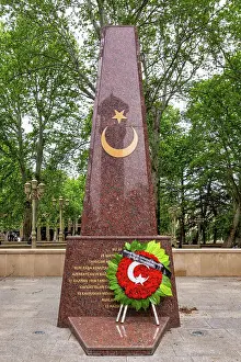 Wahrzeichen Prints: Turkish Martyrs Memorial, a red granite obelisk in Ganja