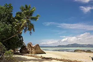 East Africa Prints: Typical rock formations in the Seychelles with a sandy beach