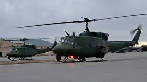 Visit Prints: A UH-1N Huey helicopter, carrying Chief Master Sgt