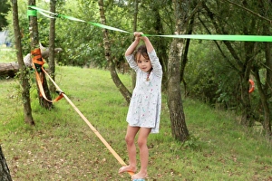Outdoor Pursuit Prints: UK, Girl on slackline in park