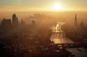 Skyscraper Prints: UK, London, Aerial view of city and Thames river at sunset