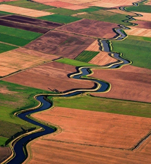 Landscape Scenery Prints: UK, Lytham St. Annes, Aerial view of river meandering through fields