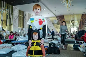 Society Prints: Ukranian refugees at a temporary shelter created inside the big ballroom
