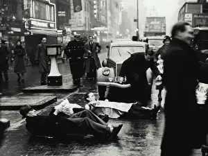 Unemployed Prints: Unemployed Men Lie Down in Oxford Street -- The unemployed men lying in the road at the corner of Oxford Street