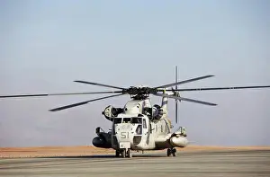 Blade Prints: United States Marine Corps CH-53D Sea Stallion heavy lift transport helicopter taxis along flight line at Camp Bastion