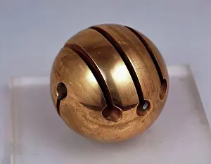 Ball Prints: Untitled. Arnaldo Pomodoro (b.1926). Bronze with gold patina. Signed and dated 1968. 11cm