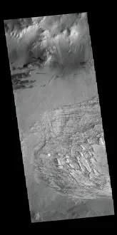 Mars Prints: The unusual texture seen in this image of Galle Crater is likely layered deposits that have been eroded