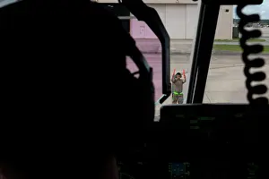 Pilot Prints: A U.S. Air Force air crew with the 4th Special Operations Squadron participates in a training sortie on an AC-130J