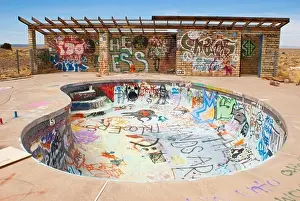 Arizona Prints: USA, Arizona, Graffiti in abandoned swimming pool at Two Guns ghost town