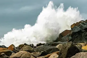 Jaynes Gallery Prints: USA, California, Morro Bay. Waves crashing over jetty rocks