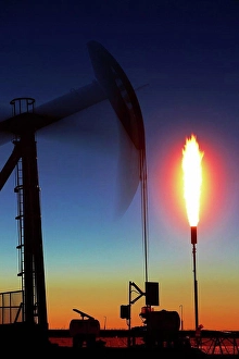 Lifting Prints: USA, Colorado, Oil well pumpjack (pump jack) and gas flare (flare stack)